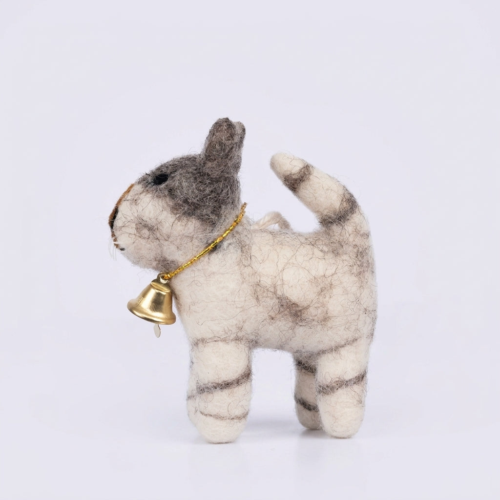 Handmade wool felt tabby cat ornament with a gold bell on a white background