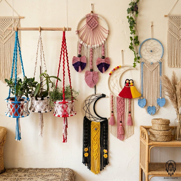 Collection of decorative wall hangings including dream catchers and macrame plant holders on a neutral wall.