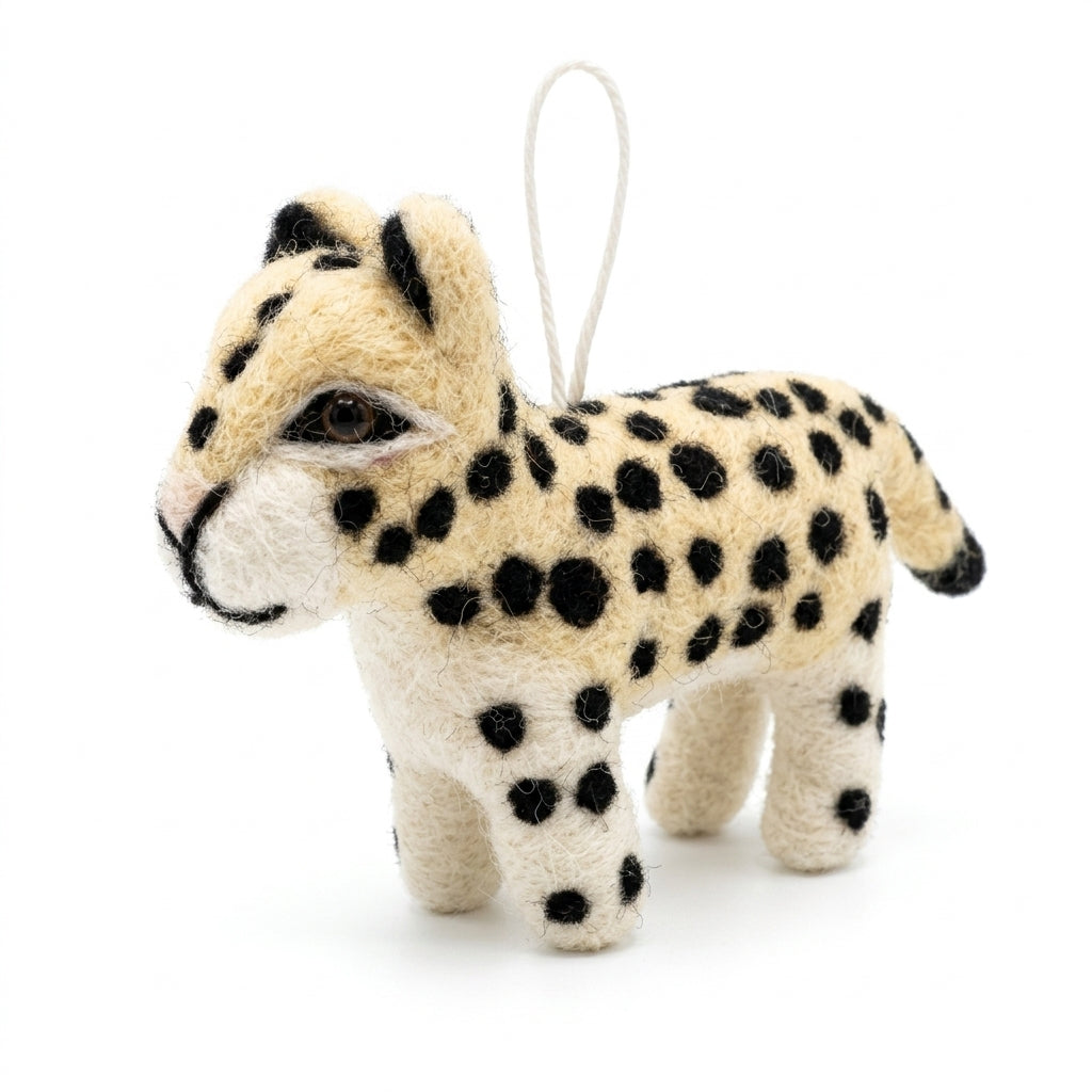 Handmade wool felt leopard ornament with hanging thread
 on a white background