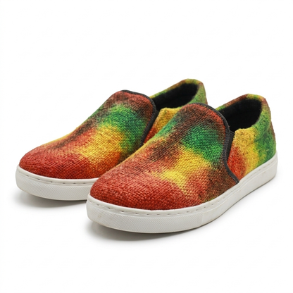 Handmade organic hemp Rasta tie-dye slip-on canvas sneakers in red, orange, yellow and green with white rubber soles