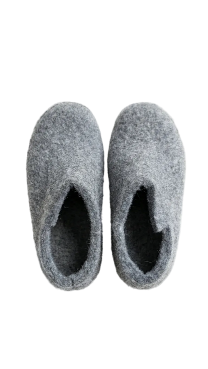 Pair of gray slippers on a white background