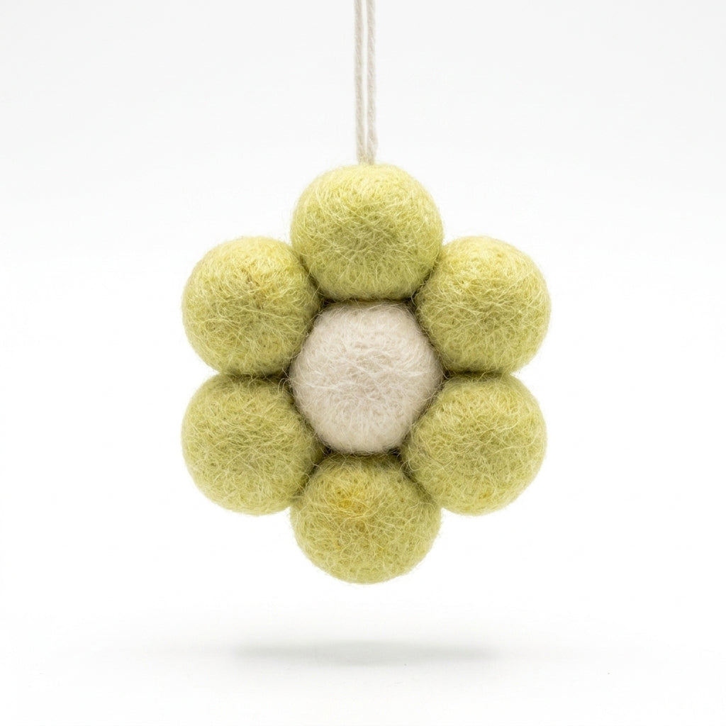 yellow wool felt flower hanging ornament ornament with green and white balls on a white background