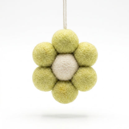 yellow wool felt flower hanging ornament ornament with green and white balls on a white background