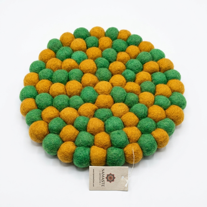Australian colours green and mustard wool felt trivet heat mat handmade pot mat top view with Namaste Artisans tag