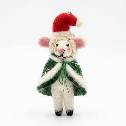 A handcrafted 100% pure New Zealand wool Winter Wanderer Sheep Christmas ornament wearing a red Santa hat and green cape embroidered with white snowflakes, standing against a plain white background.