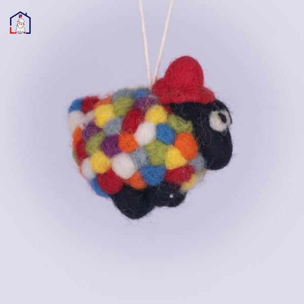 "Handmade wool felt Sheep Christmas ornament with colorful polka dots."